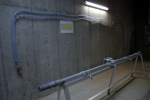 オラリオンｻｲﾄ地下貯水槽横に整備した取水用蛇口と接続ホース